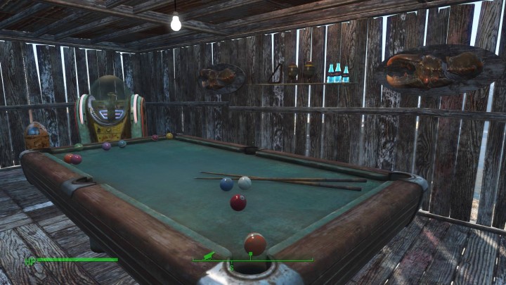 My perfectly arranged pool room. Complete with juke box and mini-nukes. 
